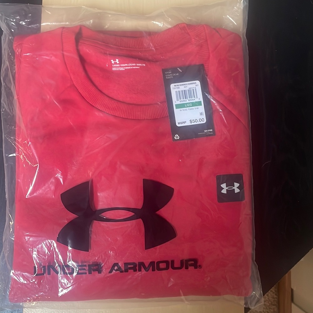 Large Under Armour red crewneck sweatshirt.still in the plastic.Non smoking home